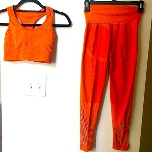 Size small, orange yoga pants with matching top.